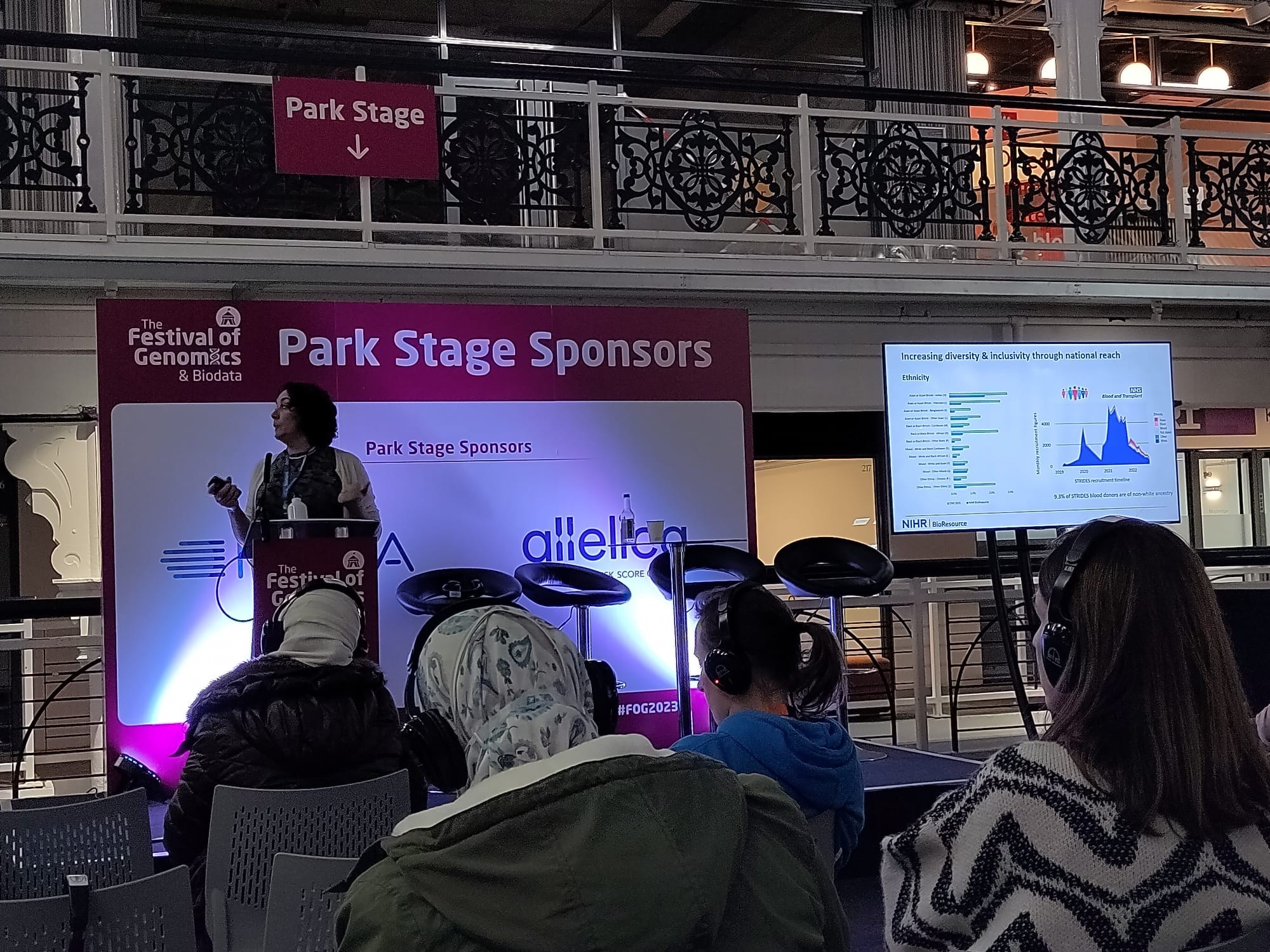 Nathalie Kingston presenting on stage at the Festival of Genomics