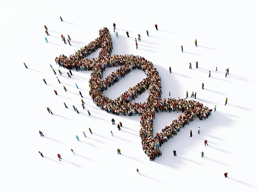 Crowds of people formed into a DNA helix shape