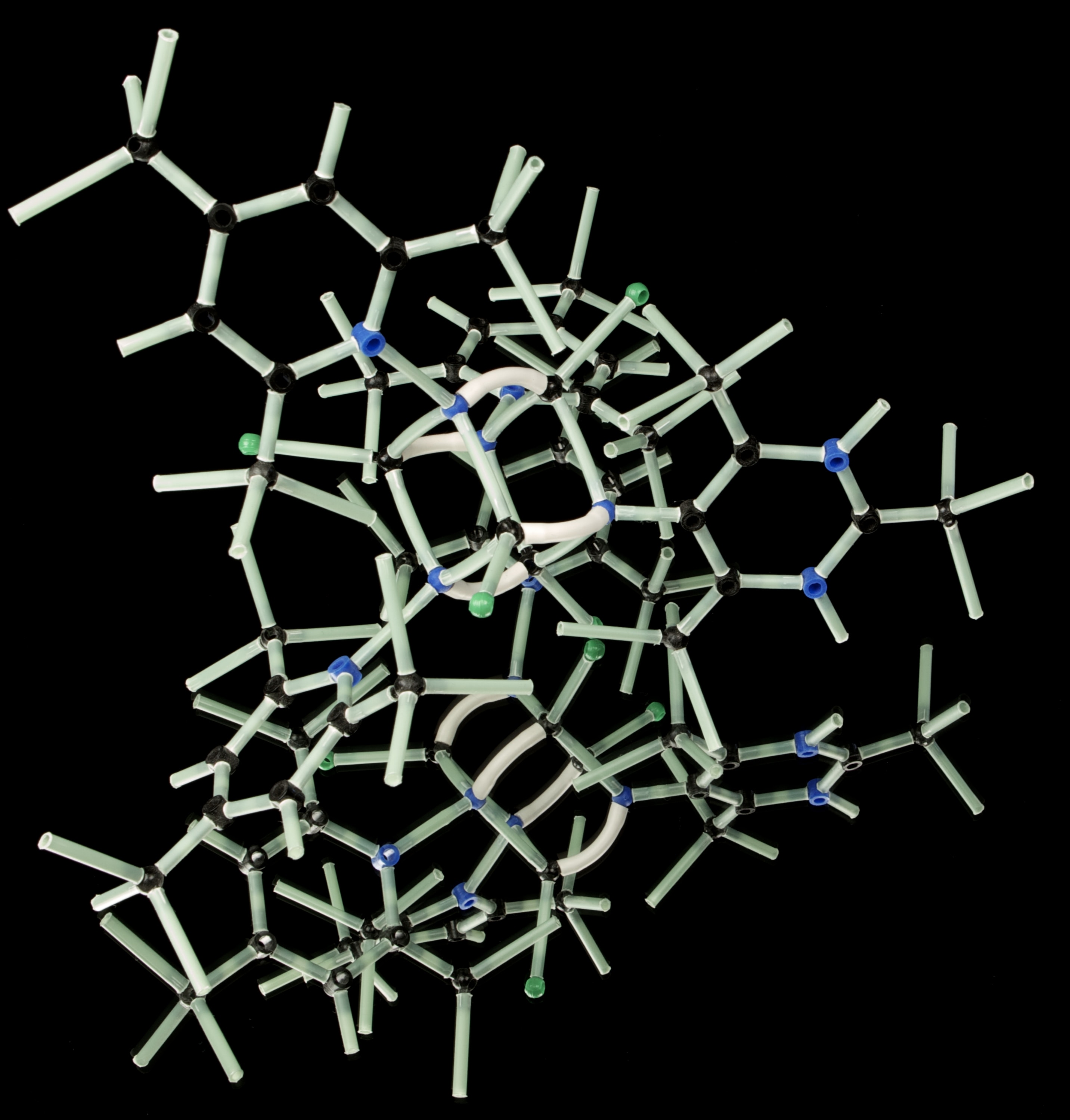 Genetic code structure in white on a black background