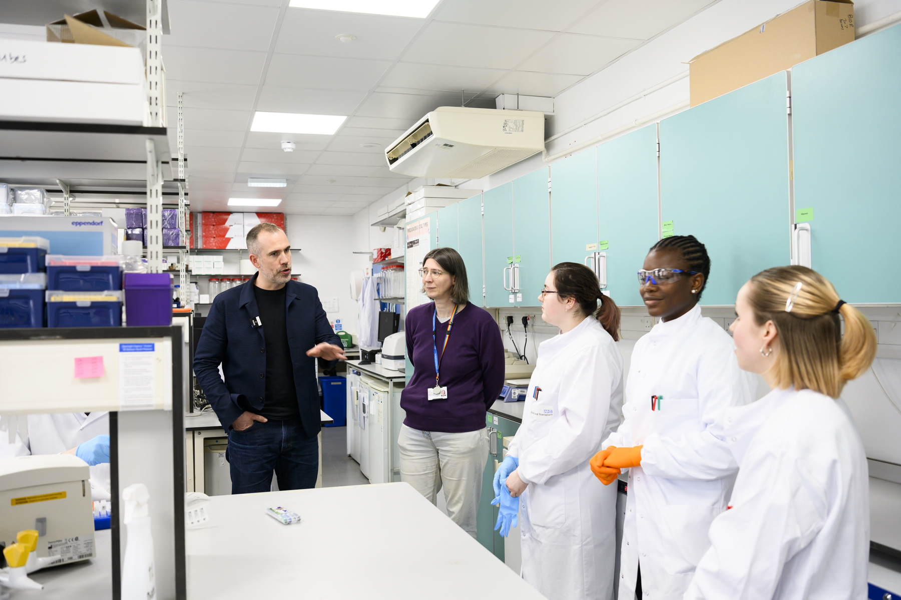 Dr Xand at the lab with BioResource technicians Dr Xand at the lab with BioResource technicians