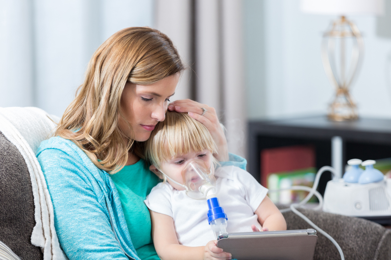 Image of mother with child suffering from Cystic Fibrosis Image of mother with child suffering from Cystic Fibrosis