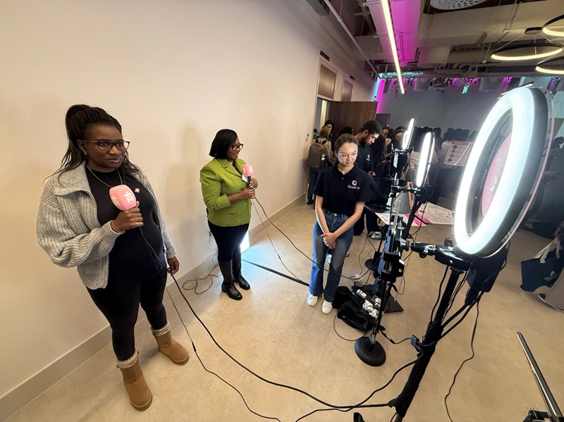People at the Black Maternal Health Conference using microphones